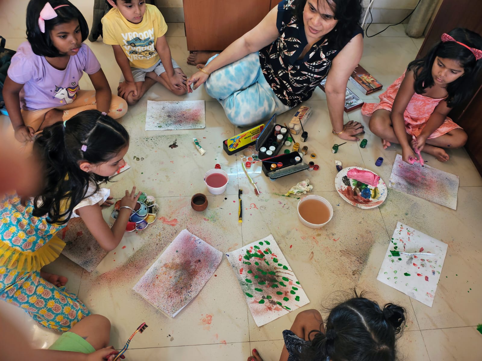 Children painting together